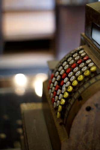 antique cash register, blurry background