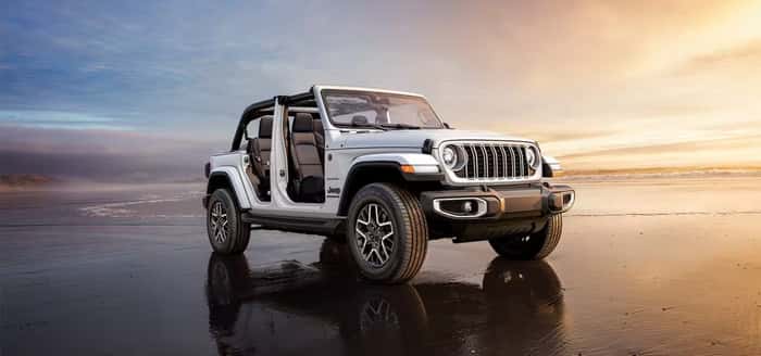 White 2025 Jeep Wrangler with the doors off