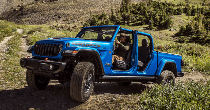 Blue 2025 Jeep Gladiator driving off road