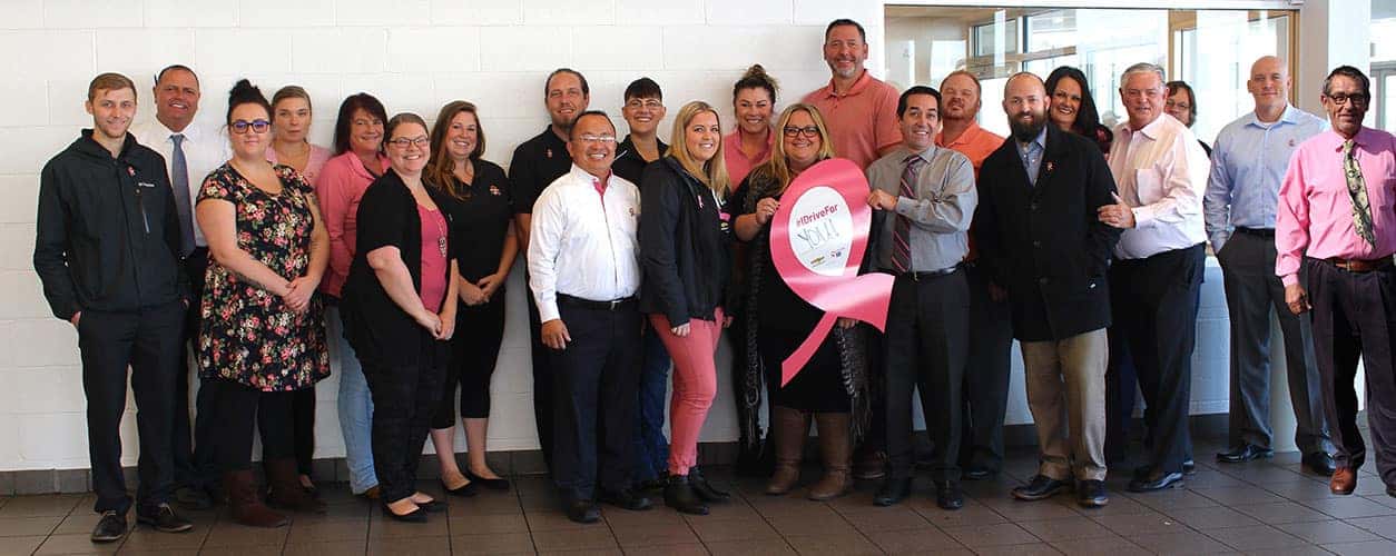 Group photo of Bud Clary Chevrolet team for the Drive for You Event