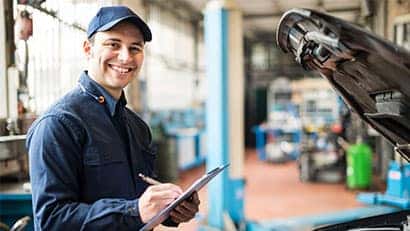 stock photo of an auto service tech