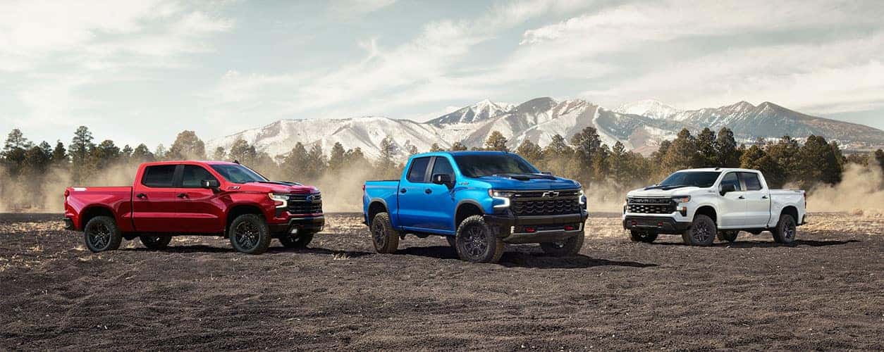 3 chevy silverados lined up
