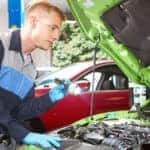 Honda technician working on engine