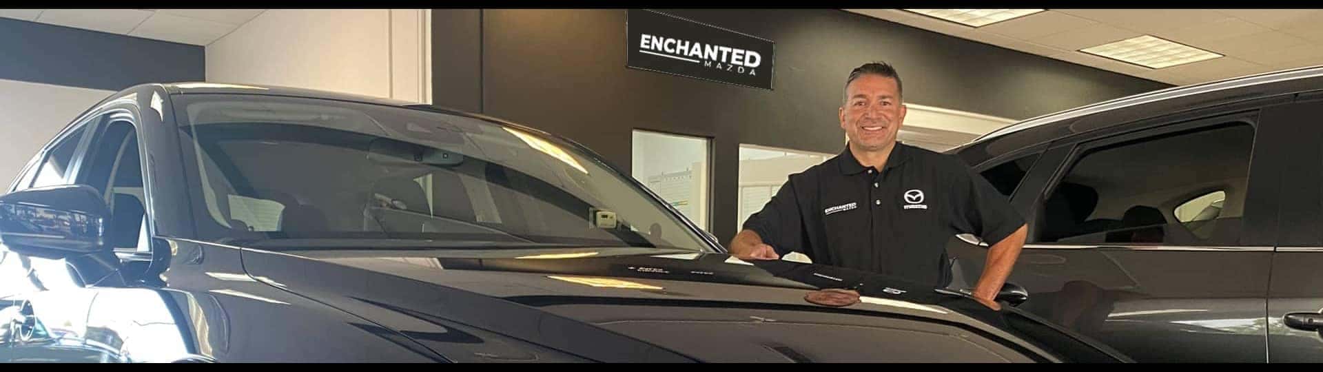 buddy standing in front of mazda - black background