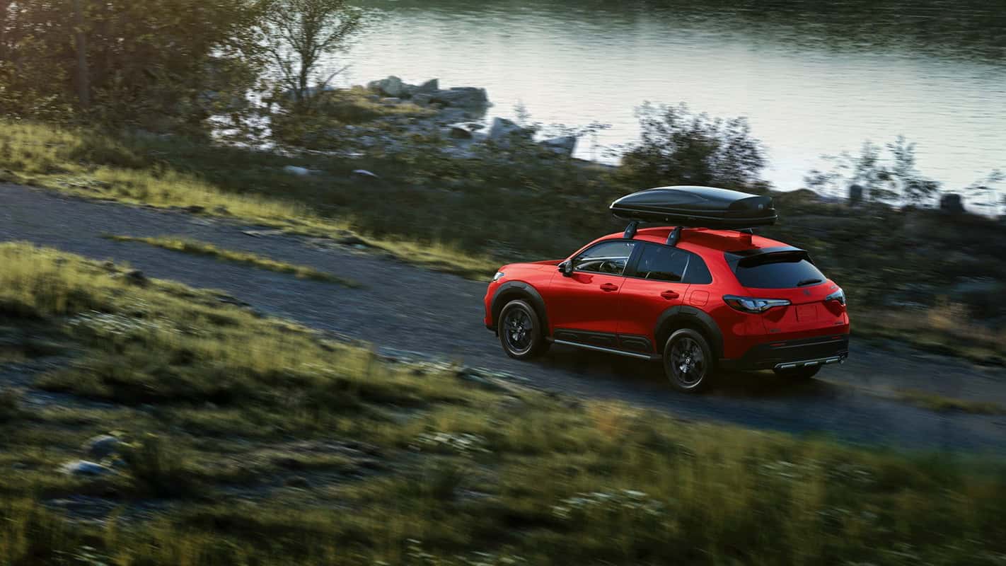 2027 Honda HR-V Sport AWD red exterior side view