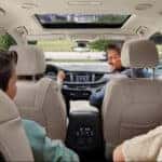 Certified Pre-Owned Buick and GMC SUVs with family inside showcasing comfort and spacious interior design.