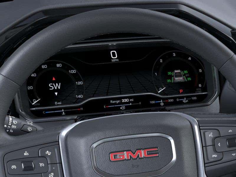 Close up of the 2025 GMC Sierra 1500 digital driver display and steering wheel