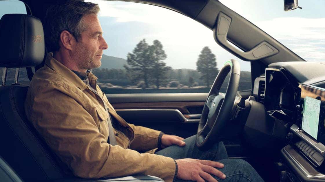 Driver using advanced hands free driving technology inside the 2025 Chevy Silverado 1500