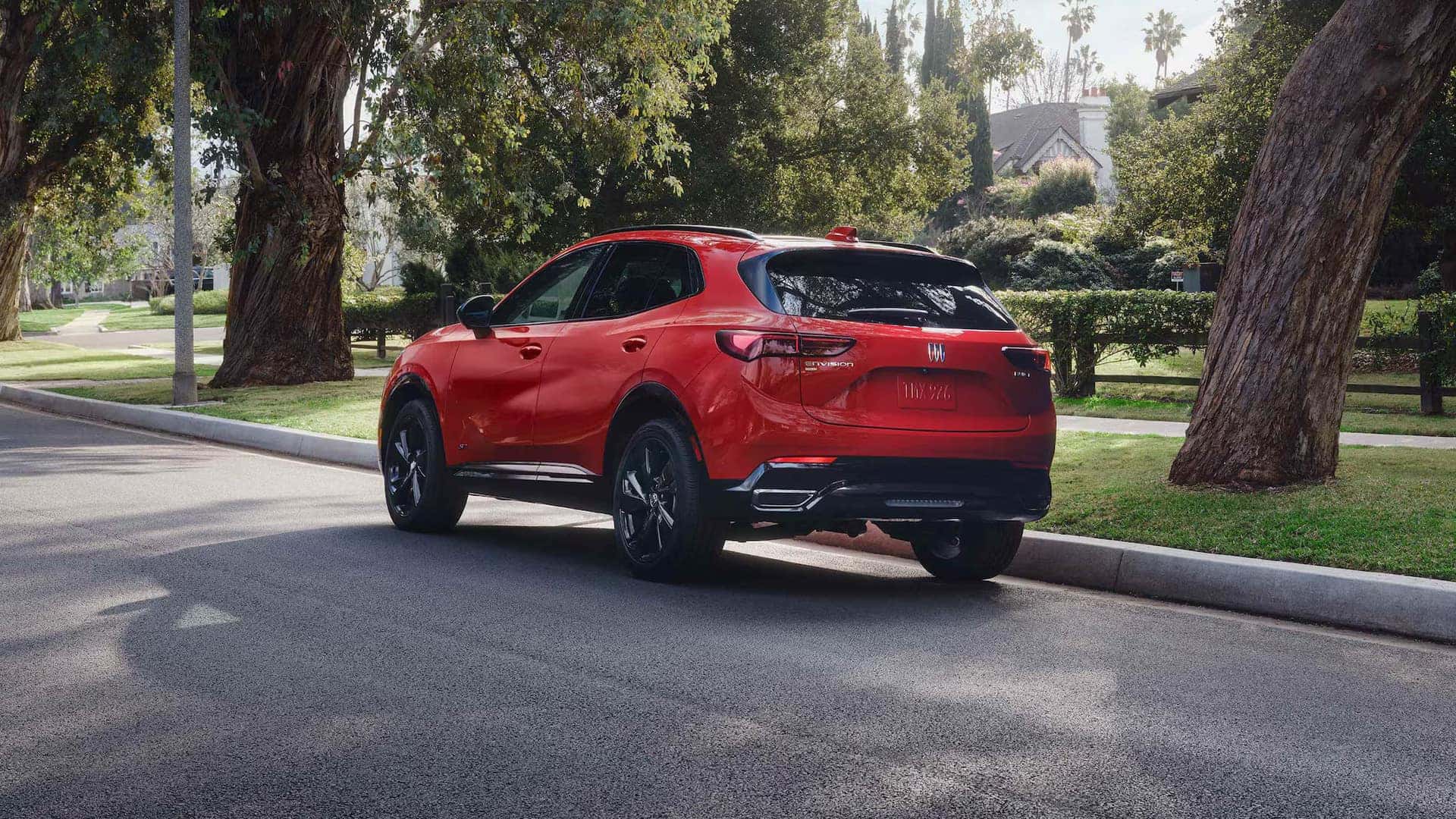 2026 Buick Envision and GMC Terrain driving on the road.