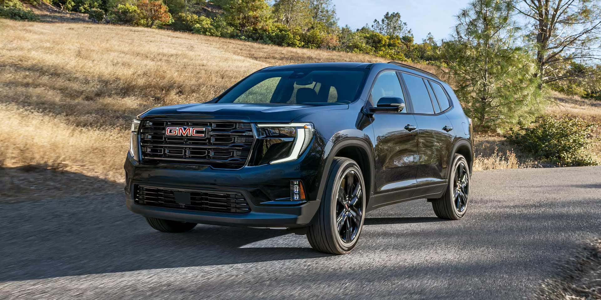 New 2026 GMC Acadia driving in Marion Indiana