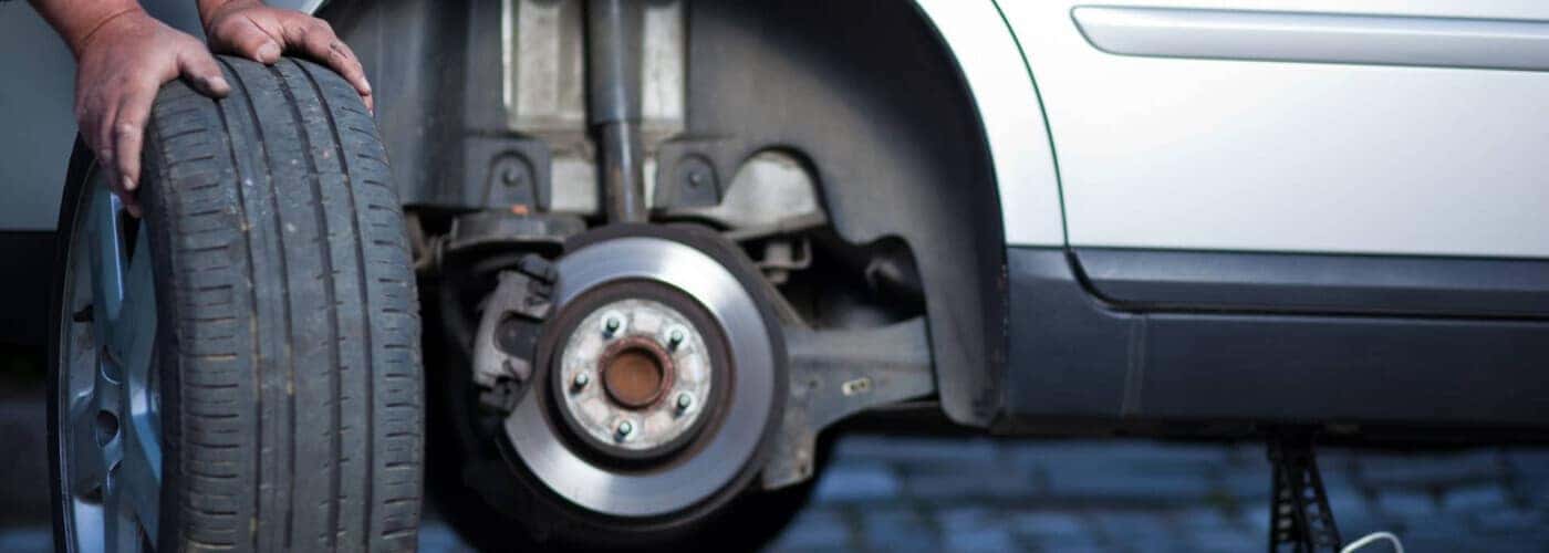 The tire being changed on a vehicle.