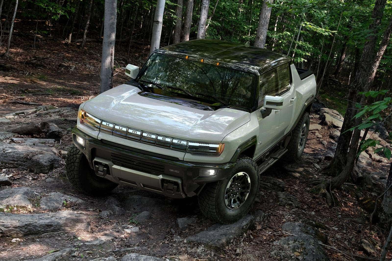 2026 GMC Hummer EV Pickup dominating off-road terrain