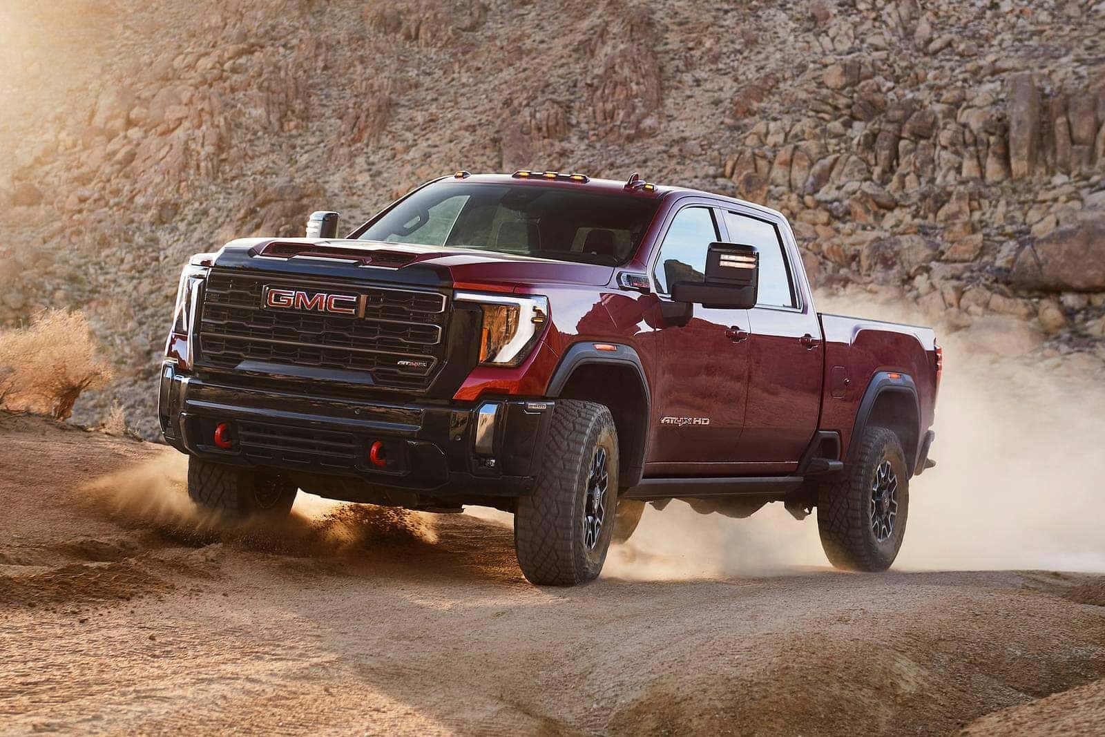 2026 GMC Sierra 2500HD conquering off-road terrain