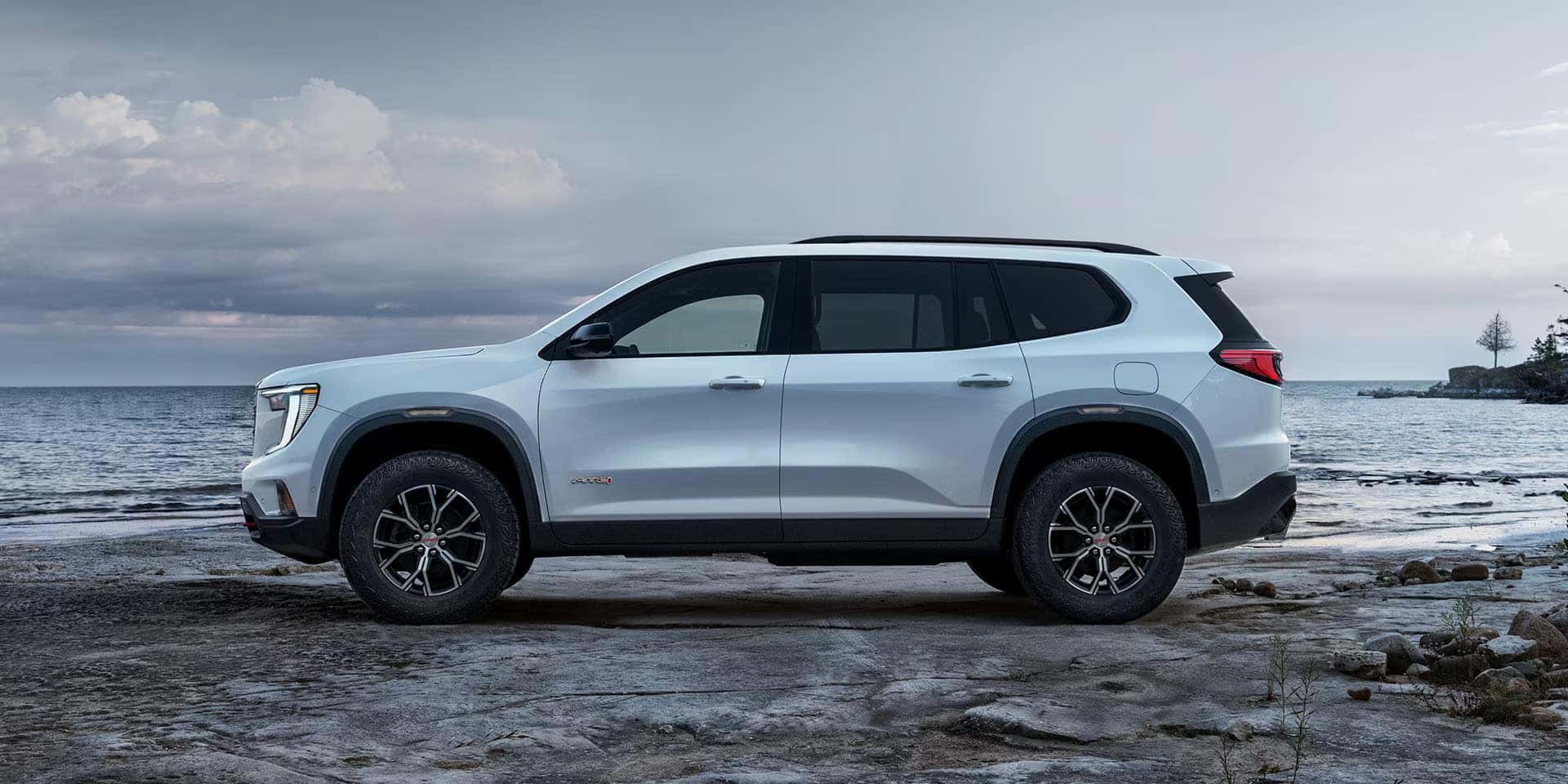 Close up of GMC Acadia AT4 all-terrain tires and suspension