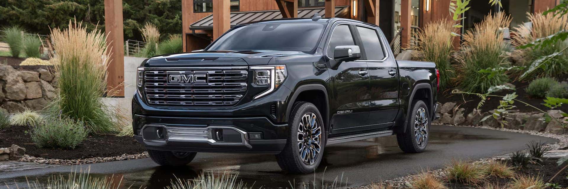 a new 2026 GMC Sierra 1500 parked outside of a home