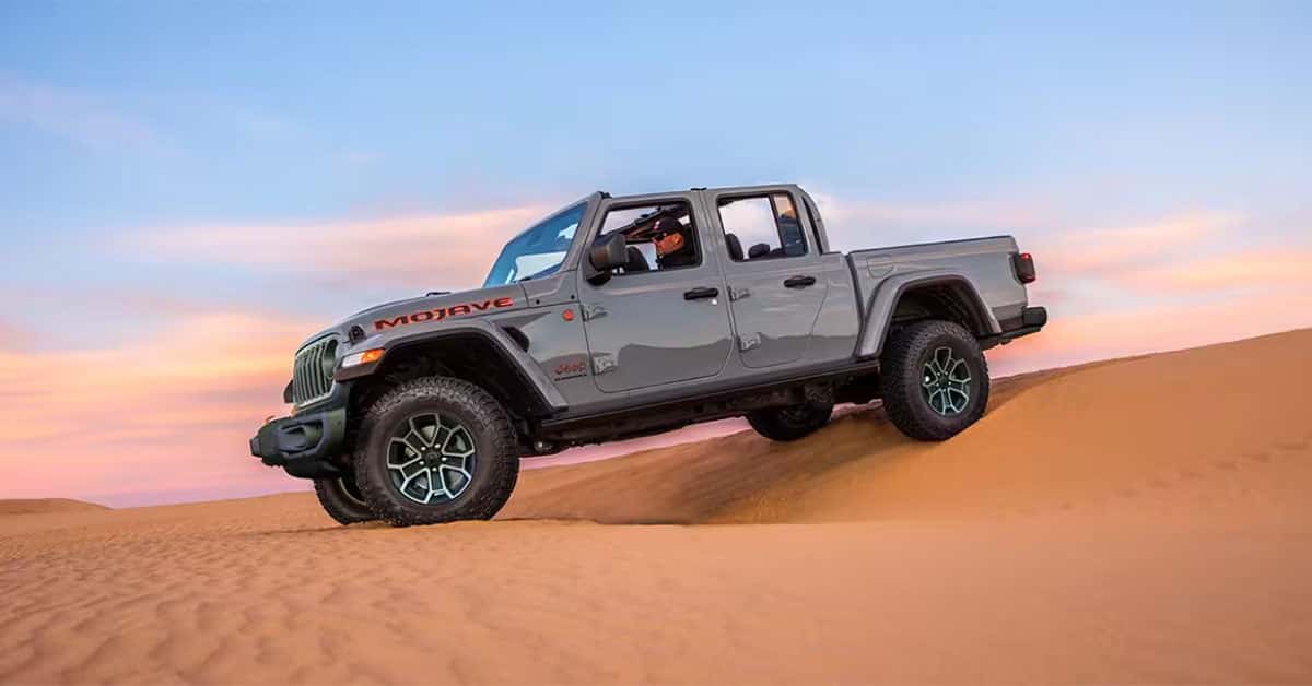 2025 Jeep Gladiator stretched over sand dunes