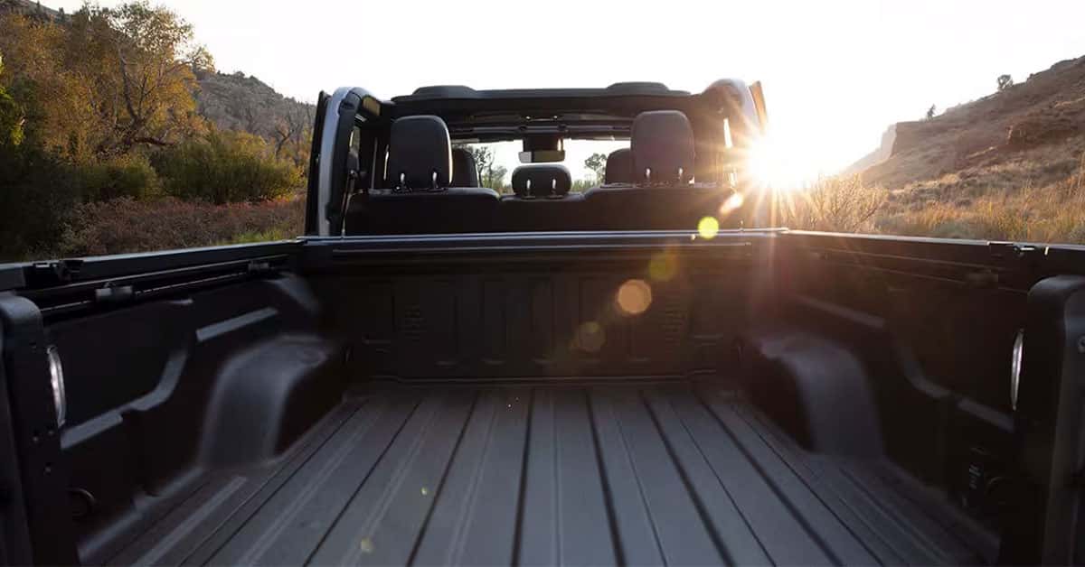 2025 Jeep Gladiator Truck bed with sunlight beaming into frame