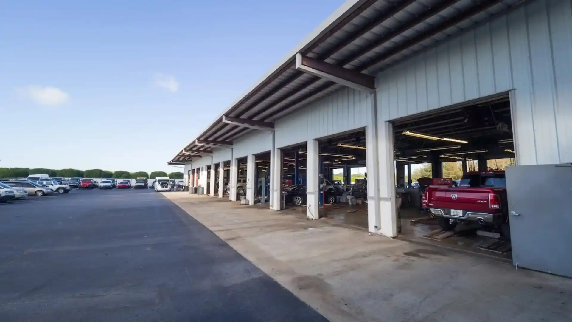 CDJR service bay with vehicles being serviced
