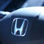 A sleek steering wheel highlights the Civic interior.