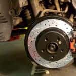 A mechanic replaces brake rotors in Marion, IL
