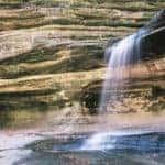 Water flows through a waterfall at Starved Rock near Marion, IL