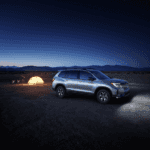 A Honda Pilot is parked for a night under the starts at a camping site in Marion, Illinois