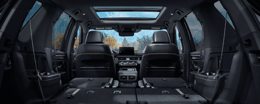 2024 Honda Pilot trunk showing folding backseats.