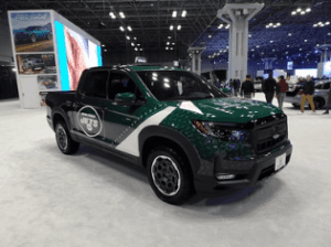 2024 Honda Ridgeline parked in a Marion, IL showroom.