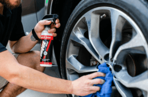 Main scrubbing his tire to keep it shiny.