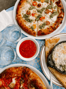 Two pizza's on a Marion, IL restaurant table.