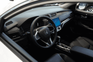 Honda sedan interior features and radio.