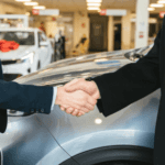 Two men shaking hands after leasing a new Honda in Marion, IL.