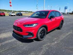 red 2026 Honda HR-V crossover parked at the Ike Honda dealership in Marion, IL