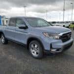 grey 2026 Honda Ridgeline truck parked at the Ike Honda dealership in Marion, IL