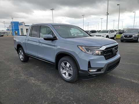 grey 2026 Honda Ridgeline truck parked at the Ike Honda dealership in Marion, IL