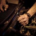 mechanic working on a car