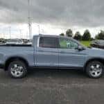 side view of a 2026 Honda Ridgeline truck parked at the Ike Honda dealership in Marion, IL