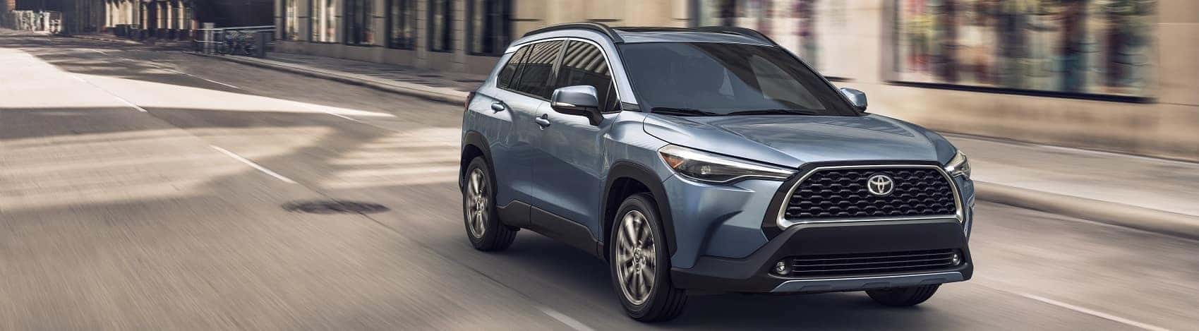 Blue Toyota driving