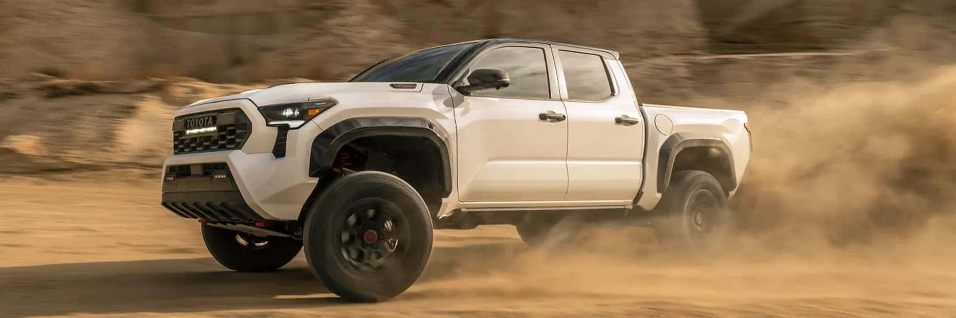 2026 toyota tacoma driving through sand