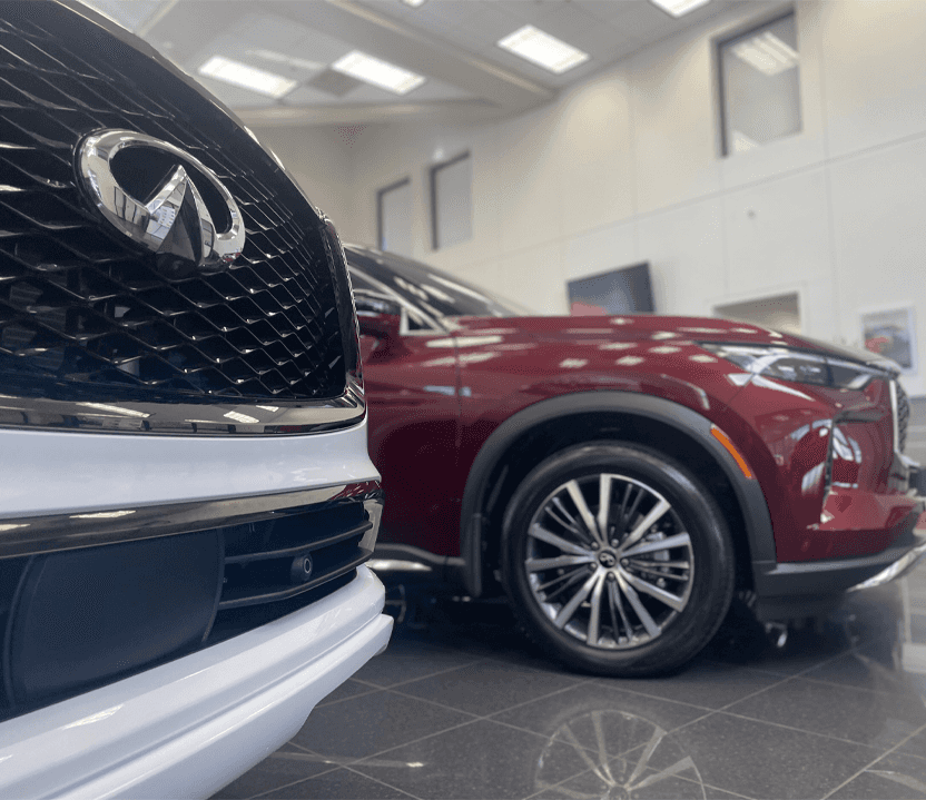 Two INFINITI SUVs in Kelly INFINITI Showroom