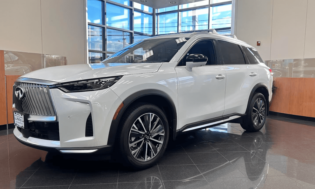 2026 QX60 Earns Top Family SUV Honor White 2026 INFINIT QX60 SUV in Kelly INFINITI Showroom