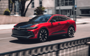 2024 Toyota Crown Platinum shown in Supersonic Red with Black bi-tone near LaPlace