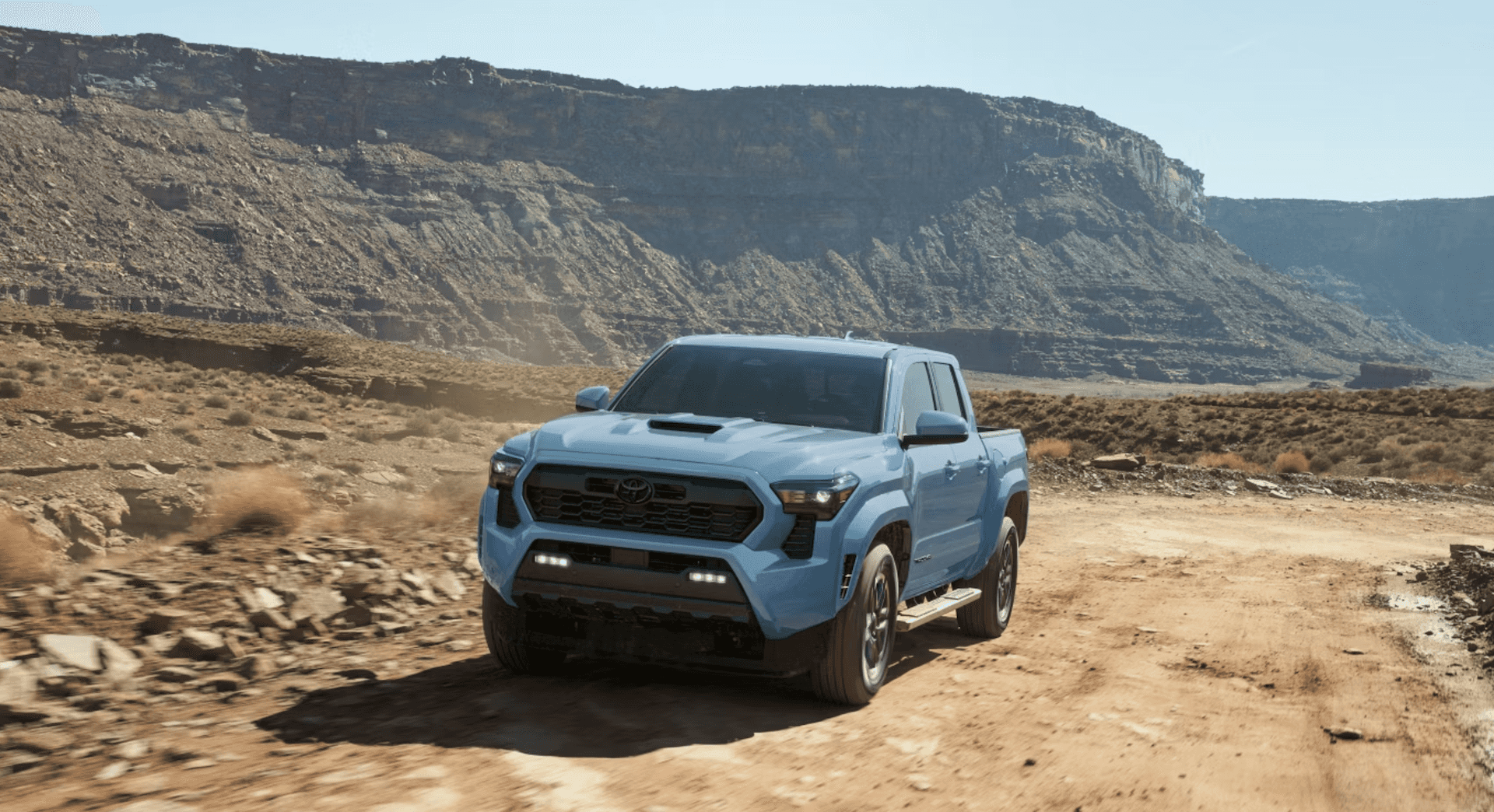 2026 Toyota Tacoma TRD Sport shown in Heritage Blue with available side step accessory for sale in Metairie, LA