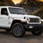 White Jeep Wrangler parked on the road