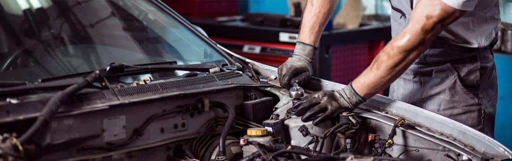Man Fixing Car 