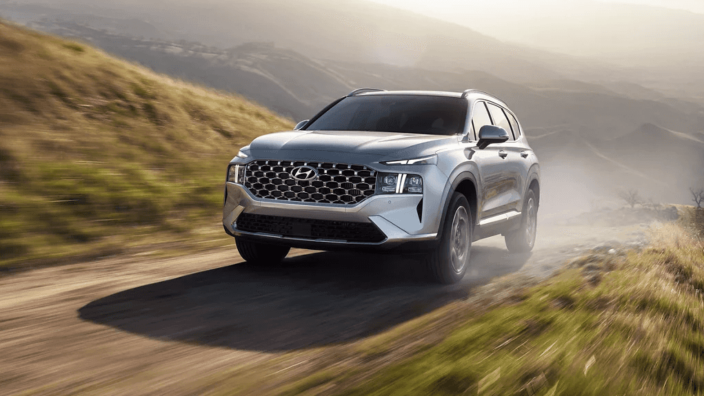 Silver 2022 Santa Fe Driving outdoors