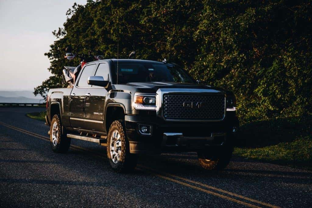 a new GMC Sierra on a back road in Stillwater Oklahoma