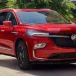Red Buick Enclave SUV Trees