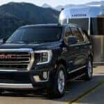 Black GMC Yukon SUV Metal Trailer Green Mountains