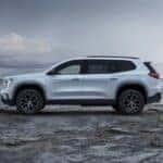 White GMC Acadia SUV Beach